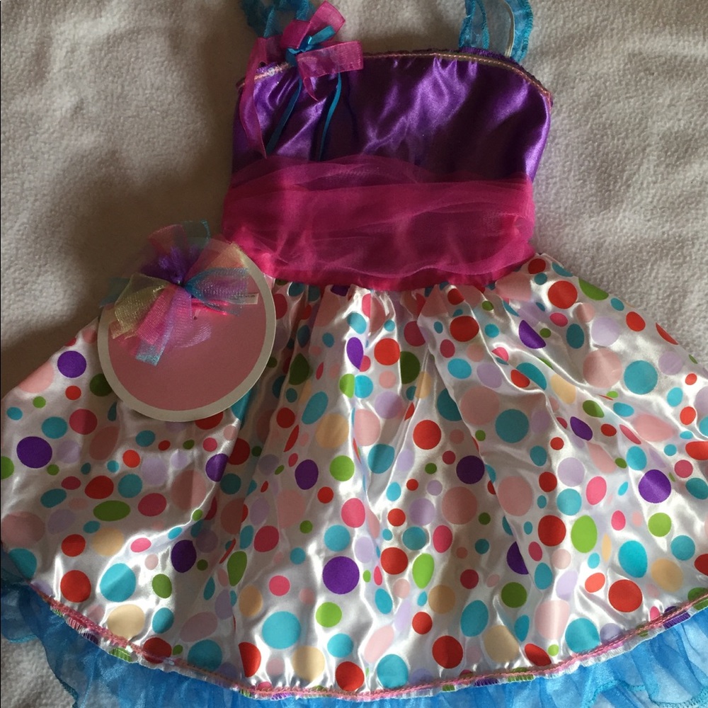 Play dress . NWOT. Size 4-6x
